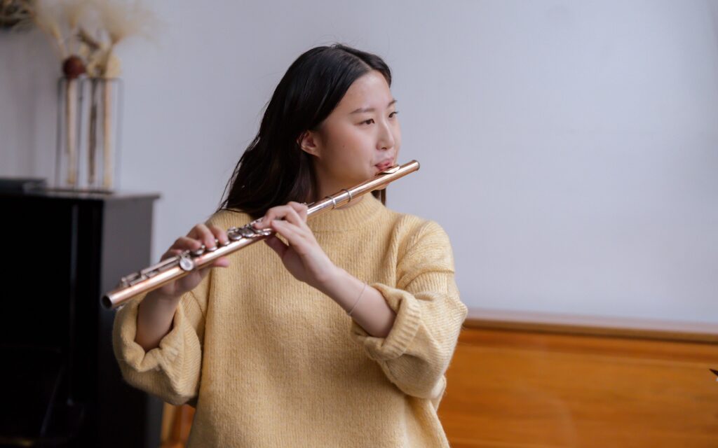 Woman playing flute