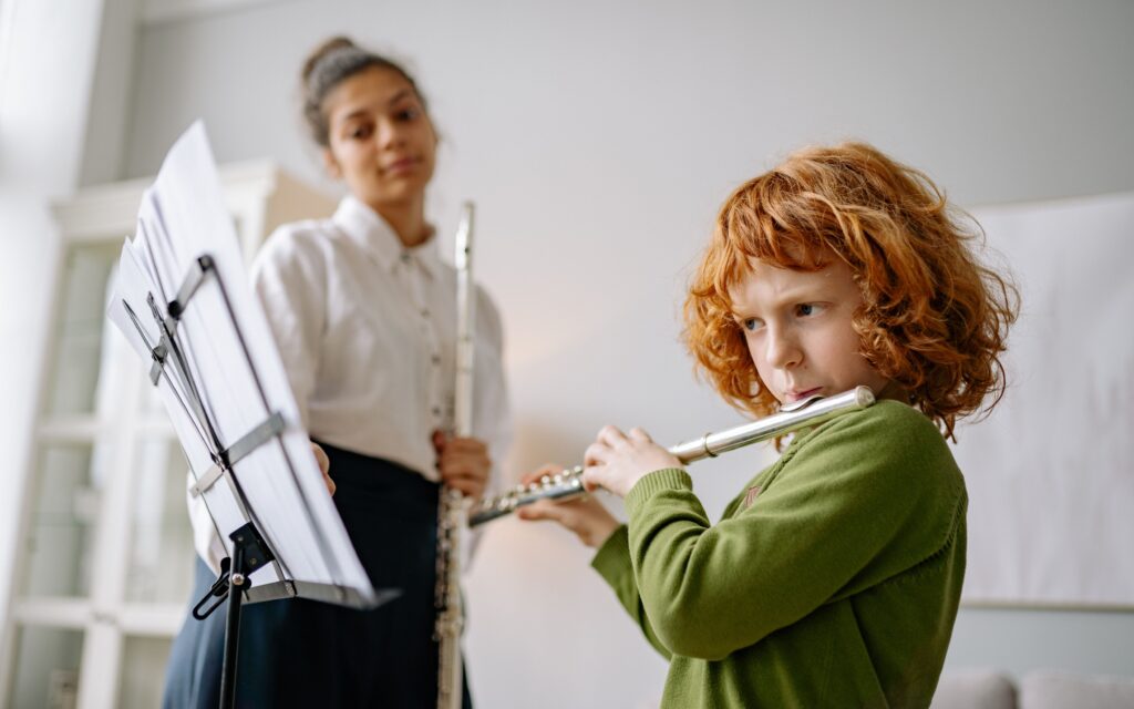 Teacher and student having flute lessons